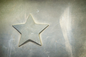 Details of a vintage car close-up. Details of military equipment. Metal star adorning the hood of a vintage armored vehicle. for advertising.