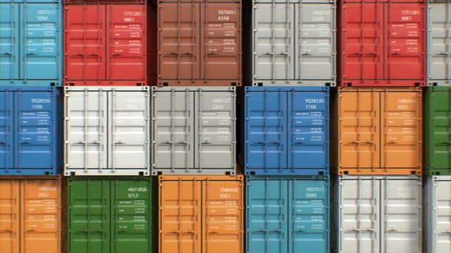 Moving at the Containers Terminal Seamless. Looped 3d Animation of Colorful Containers Rows. Transportation Business and Logistics Concept. 4k Ultra HD 3840x2160.