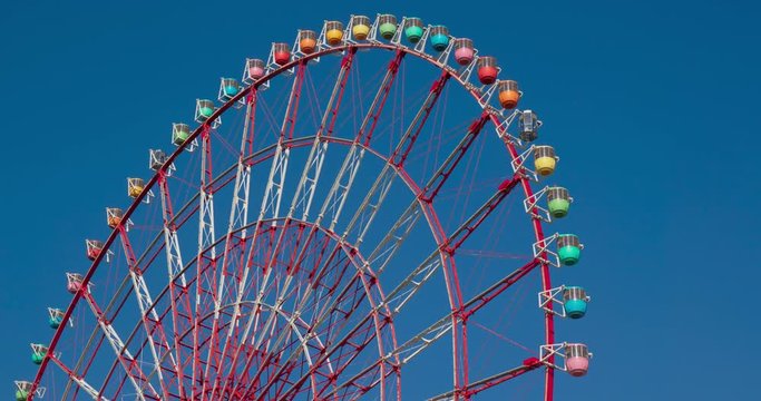 Ferris wheel with clear blue sky