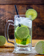 Beer caipirinha. Brazilian exotic drink of beer with lemon and cachaça.
