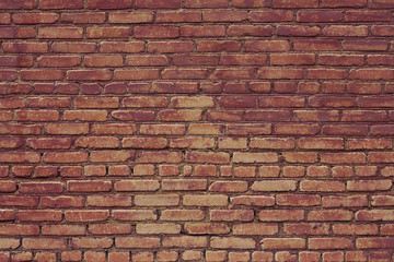 The texture of the old wall of red bricks