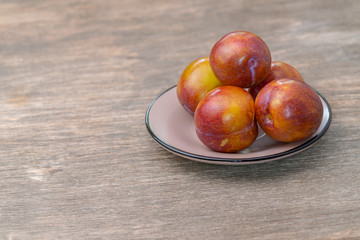 Ripe juicy plum to maintain a beautiful and slim figure, plum diet.