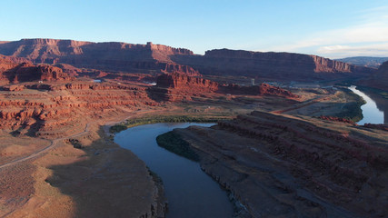 Aerial view of desert, Colorado river in Utah. Scenic nature near the Canyonlands national park, Moab. Sunny morning, sunrise.