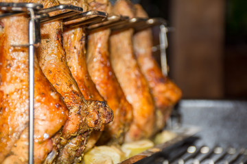 Close Up of Chicken Drumsticks covered by Seasoning Roasted in the Grill