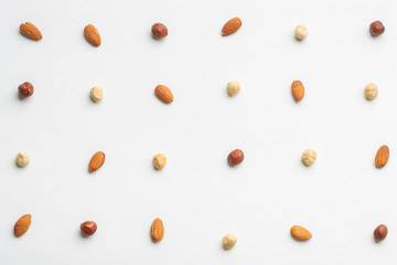 Composition of nuts pattern on white background