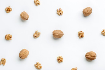 Composition of nuts pattern on white background