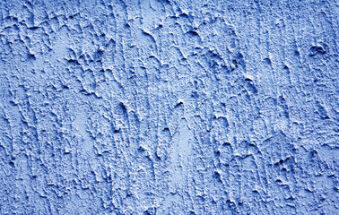 textured backgroundwith space for text. Texture rough plaster on the wall of concrete. Light blue