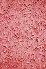 textured background with space for text. Texture rough plaster on the wall of concrete. Pink