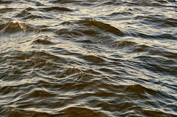 waves on the lake close up. photo taken on a cloudy day