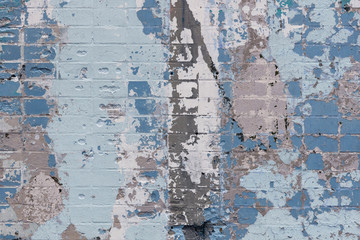 Abstract background of an old brick wall with expressive spots in gray and blue colors. Inimitable pattern