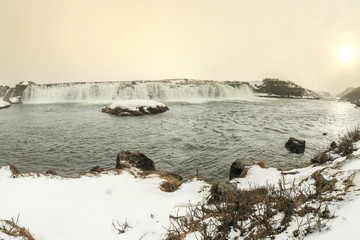 Faxafoss waterfalls along the Golden Circle route in snowy Winter Iceland