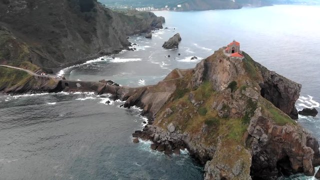 Drone view of san Juan de gaztelugatxe landscape rocks with dron sea