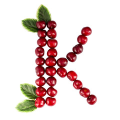 One English letter K Alphabet of ripe cherries. Isolate on white background. Summer, healthy concept