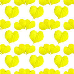 seamless texture,  yellow autumn leaves in the shape of hearts