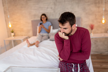 Couple fighting in bedroom