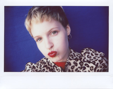 Modern woman pouting lips