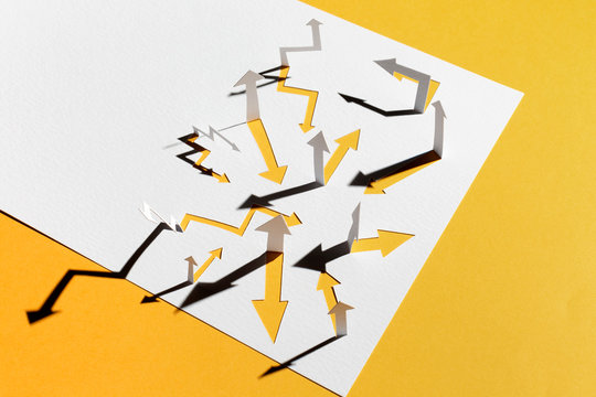 Confusing paper arrows on yellow