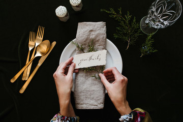 setting a holiday dinner table