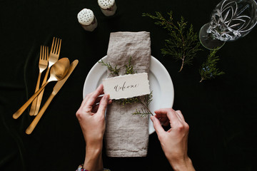 setting a holiday dinner table