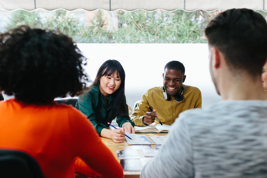 Diverse people working in stylish office