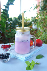 berries and milk smoothies, blue, pink, purple, coral