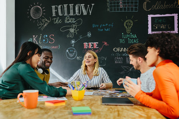 Diverse people working in stylish office