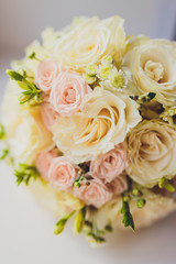 Obraz na płótnie Canvas Bouquet of flowers. The bride's bouquet. Bridal bouquet. Floristics. Wedding rings. Wedding bouquet from different colors.