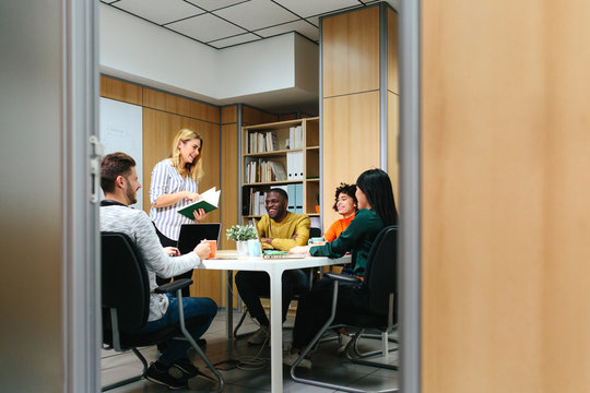 Diverse people working in stylish office