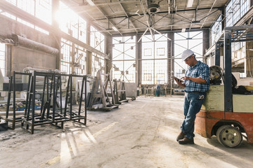 Hispanic Man using Computer at Work