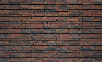 Background of an old brick wall in dark red and grey blue colors
