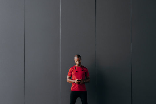 Sportsman Using Cell Phone