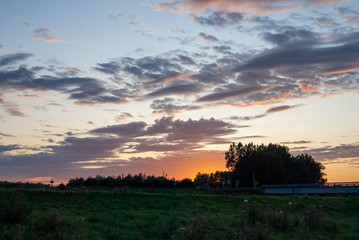 Fototapeta na wymiar Sunset Over Field