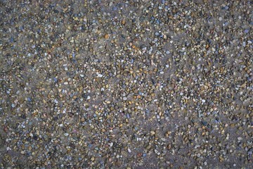 pebbles on a street abstract background