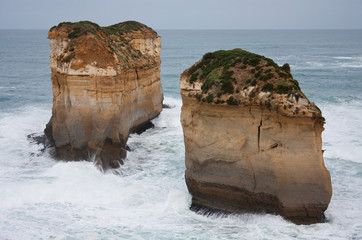 Two big cliffs and the sea at the Great Ocean Road in Australia