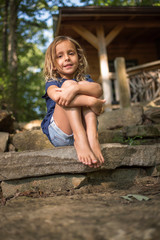 Girl sitting on rock steps in North Carolina