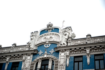 Fragment of the house in the style of art nouveau. Riga, Latvia, Alberta Street. Stucco, statues. Urban landscape.