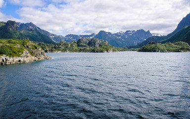 Fjords in Norway. Snow in mountains