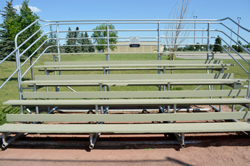 Bleachers at basefield field at a local community park.