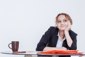 Tired woman feeling pain after sedentary computer work in uncomfortable posture or office chair, exhausted female student or employee leaned on the table, sitting at workplace