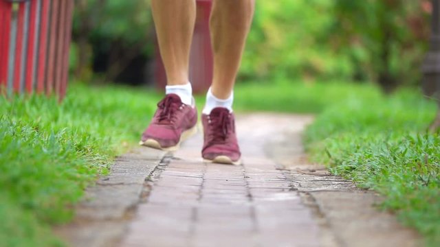 Man jogging in the park, super slow motion 240fps