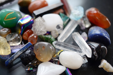 Crystal Healing collection, crystal points. Carnelian, Red Jasper, Sodalite, Clear Quartz, Citrine, Aura Quartz. Colorful assortment of crystals, bright colorful macro photo of gems. Variety of stones