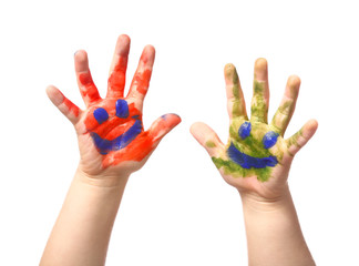 Child's hands in paint on white background