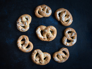 pretzels, arranged in circle, moody