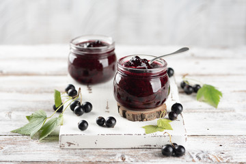 Two jars with black currant jam