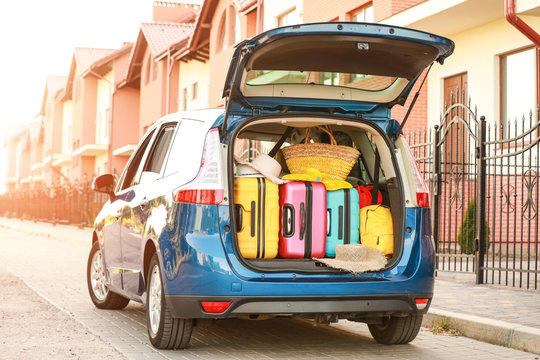 Modern Car With Luggage Outdoors