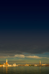 Fototapeta premium Early evening with sunset at amazing Venice watery downtown, Italy, summer time