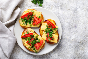 Grilled toast with tomato and cheese