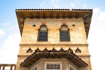 Architecture detail, old Havana style villa, low angle view.