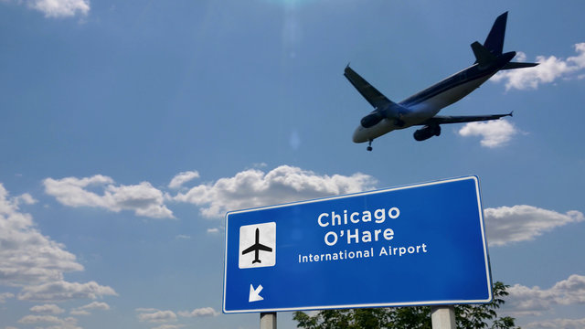 Plane landing in Chicago O'Hare with signboard