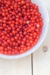 Berries red currants. Sour garden berries. Red bush berries.